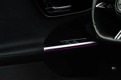 Close up view of button controlling window in modern car interior. Vehicle in Photos
