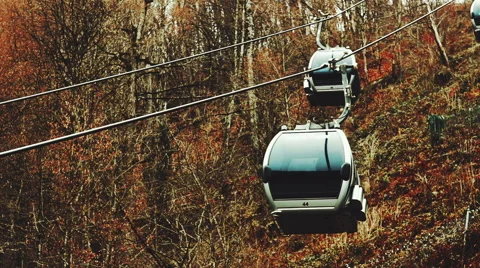 Close-up view of cableway cabins lifts up and goes down Stock-Footage 61072763