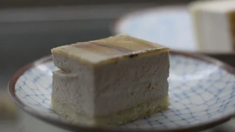 Close up view on cake with cream soft focus low light Stock Footage 163078570