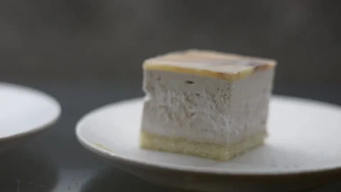 Close up view on cake with cream soft focus low light Stock Footage 163078578