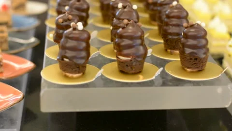 Close up view on cake with cream soft focus low light	 Video stock 196266224