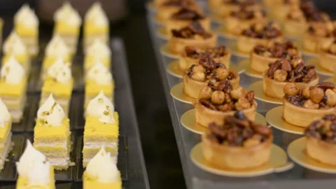 Close up view on cake with cream soft focus low light	 Video stock 196266227