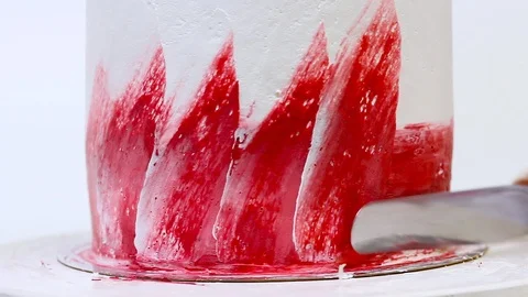 Close up view of cake decoration using confectionery spatula. Video stock 106614392
