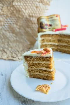 Close view of cake slice with cake on background Stock Photos