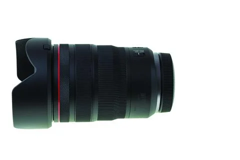 Close up view of camera Canon RF lens isolated on white background. Stock Photos
