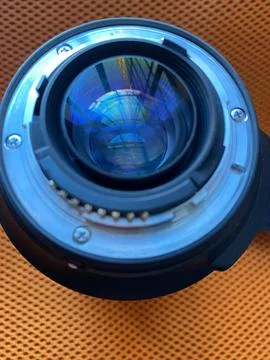 Close-up view of a camera lens mount with internal glass elements reflectin.. Stock Photos
