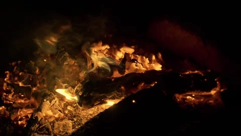 Close up view of campfire flames and fire sparks outside wild nature Video stock 251796665