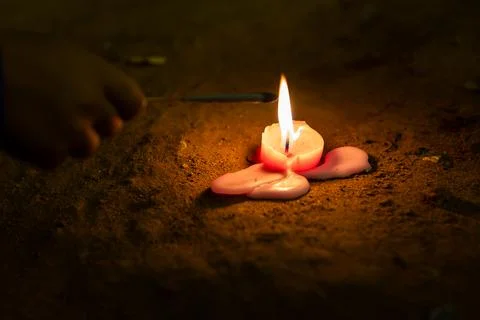 Close View of Candle Flame During Diwali Festival Worship and Spiritual Cer.. Stock Photos