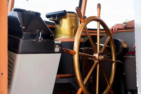 Close view into captain's cabins, navigation equipment hand of captain on ships Stock Photos