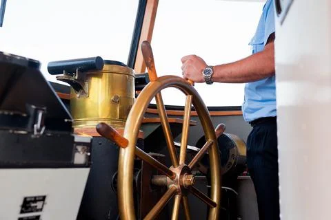 Close view into captain's cabins, navigation equipment hand of captain on ships Stock Photos
