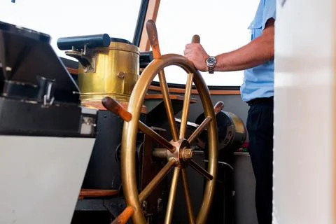 Close view into captain's cabins, navigation equipment hand of captain on ships Stock Photos