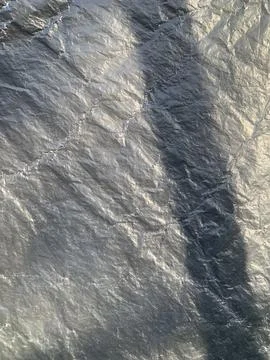 A close-up view captures the intricate textures of a weathered surface, Stock-Fotos