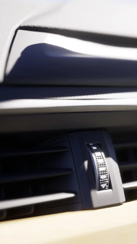 Close up view of a car air vent and control knob showing modern design details Stockbeeldmateriaal 332200794