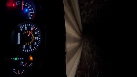 A close-up view of a car dashboard at night. Stock Footage 327132173