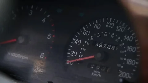 Close-up view of car dashboard speedometer and odometer displaying vehicle speed Stock Footage 328818276