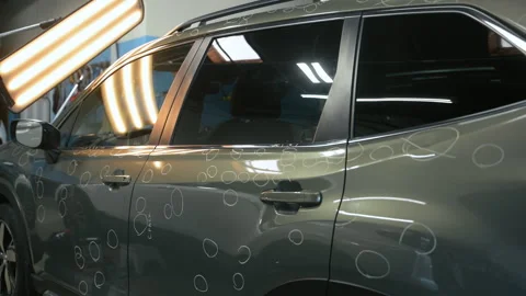 Close up view of Car with dent marks in to Preparing process of Repairing Hail Stock Footage 335966307