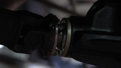 Close-up view of a car driveshaft grease fitting nipple. Stock Footage 344230364