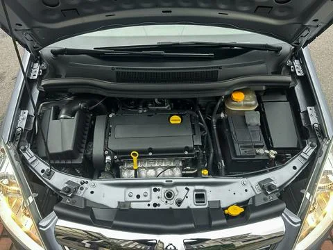 A close-up view of a car engine reveals the intricate design and cleanliness  Stock Photos