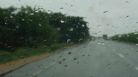 Close view of car front mirror with water droplets Stock Footage 156953979