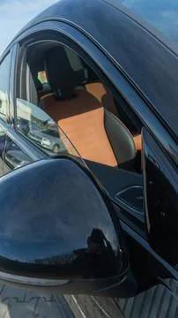 Close up view of car interior and side mirror. Modern vehicle interior with.. Stock Photos
