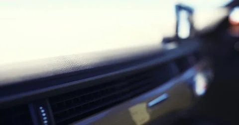 Close up view of car interior detailing at sunset Stock Illustration