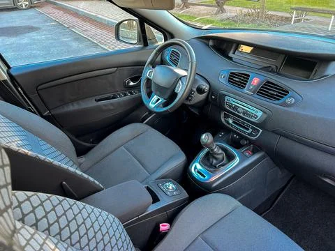 Close view of car interior showing dashboard, gear shift, and seating arran.. Stock Photos
