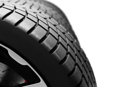 Close-up view of car tire tread on high-end wheel isolated Stock Illustration