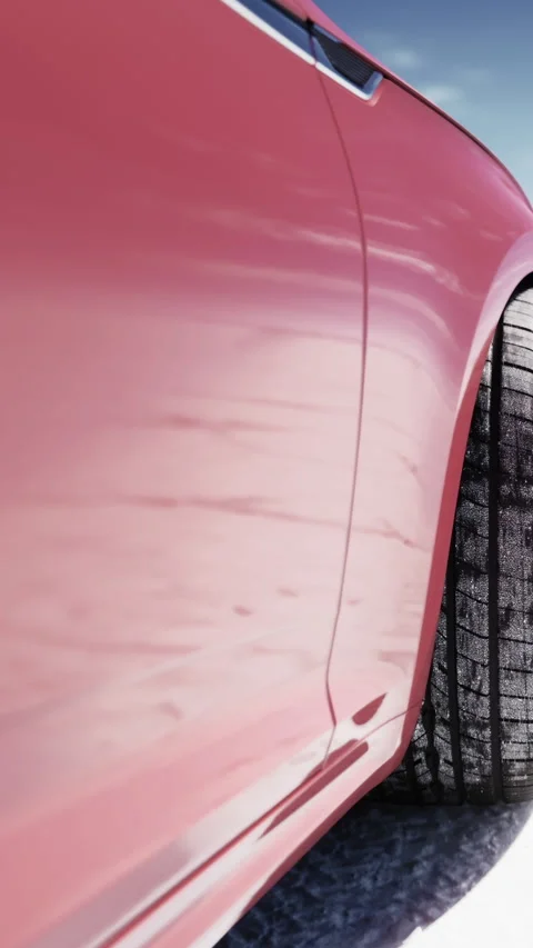 Close view of a car wheel and body on a sunny day in a parking lot Stock-Footage 338004039