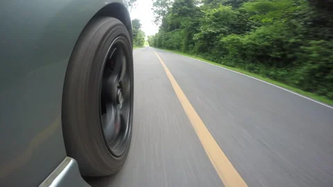 Close up view of car wheel spining Stock Footage 283014506