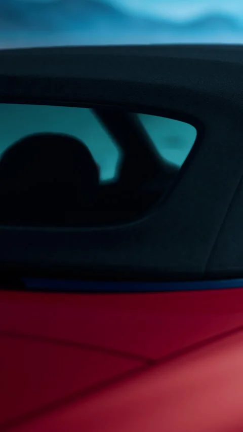 Close view of car window during sunny day with bright colors in background Stock Footage 337976012