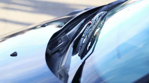 Close up view of car windshield and wipers showing vibration from powerful 스톡 동영상 325296423