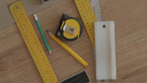 Close up view of carpentry and flooring tools on floor Stock Footage 346159763