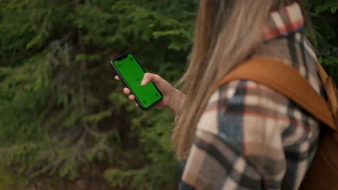 Close up view of the caucasian girl using mobile app tapping on mockup Stock Footage 229873261