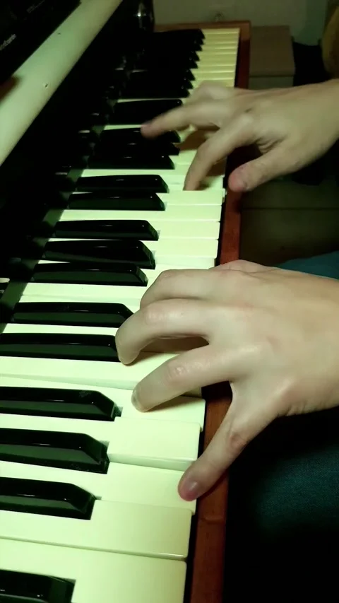 Close up view of Caucasian hands playing electric piano in bedroom Stock Footage 243126522