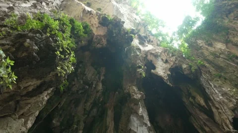Close View of Cave Wall Texture with Water Dripping in Batu Caves Stock Footage 334759940