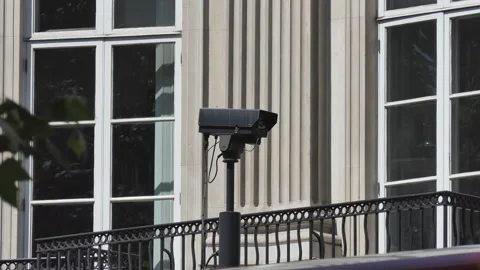 A close-up view of a CCTV camera beside a building. Stock Footage 126158426