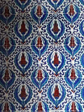 Close-up view of a ceramic tile panel showcasing a repeating pattern of sty.. Stock Photos