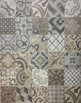 Close up view of ceramic tiles with modern and classical patterns. Stock Photos