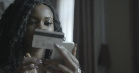 Close-up view of the charming afro-american woman with natural make-up making Stock Footage 84067982