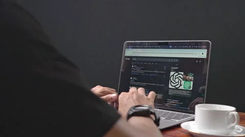 Close up view of the Chat GPT AI website on a laptop screen Stock Footage 304497051