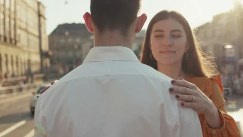 Close up view of cheerful long-haired woman strongly hugs her boyfriend 库存影片 91994666