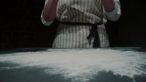 Close up view of chef cooking italian pizza. Shaping a floured pizza dough Stock Footage 155246972