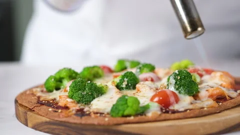 Close up view Chef hand perparing an Pizza. Stock Footage 139377940