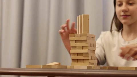 A close-up view of a chess game in progress, showing a hand moving a white pawn Stock Footage 278885688