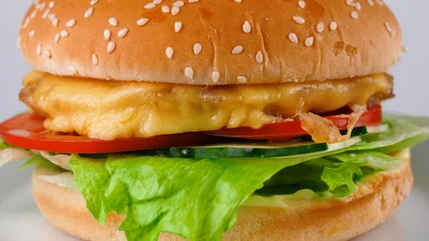 Close-up view of chicken burger with fresh vegetables and cheese Stock Footage 87791175