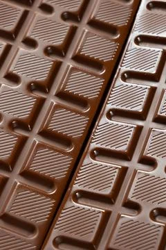 Close up view of chocolate bar squares with striped pattern Stock Photos