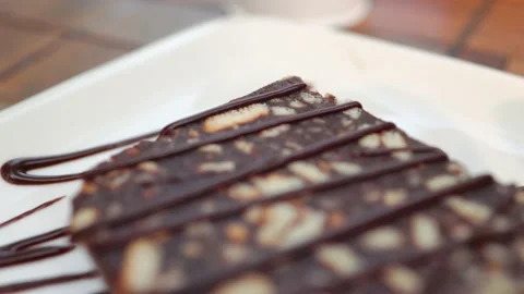Close up view of chocolate dessert on white plate Stock Footage 200478811