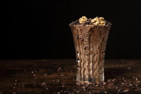 Close up view chocolate milkshake with walnuts Stock Photos