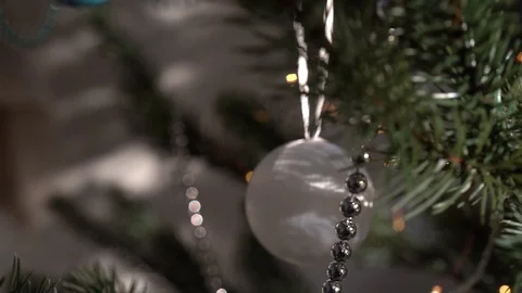 Close-up view of Christmas tree with decorations, slow motion. Stock Footage 122283542