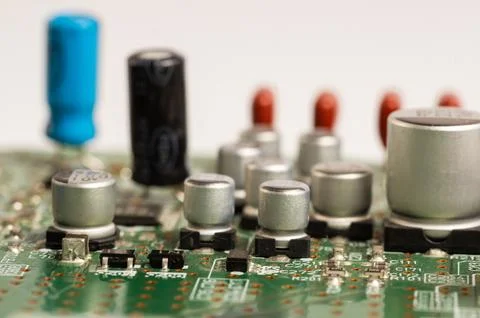 Close-up view of a circuit board with electronic components and connectors. Stock Photos